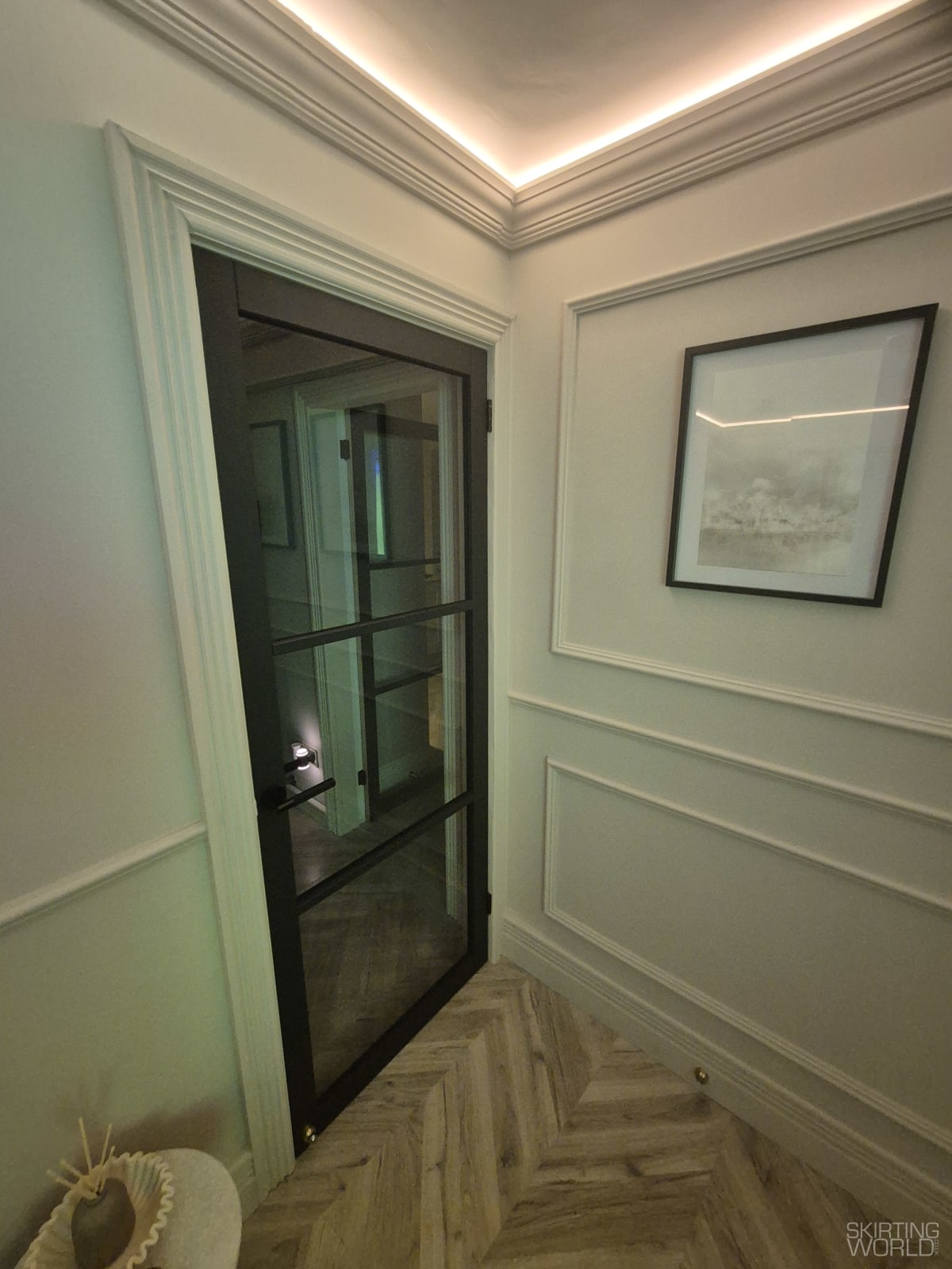 White Royal MDF architrave with white panelling in an off-white living room