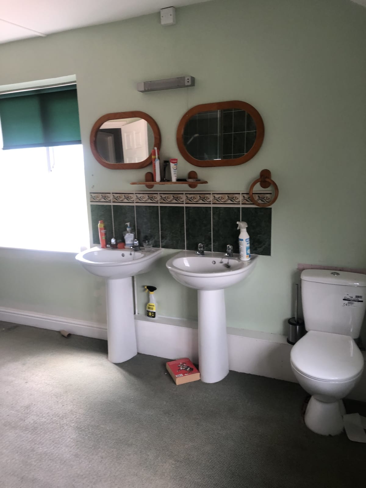 Tiled bathroom before installation of PVC panels and MDF board and batten