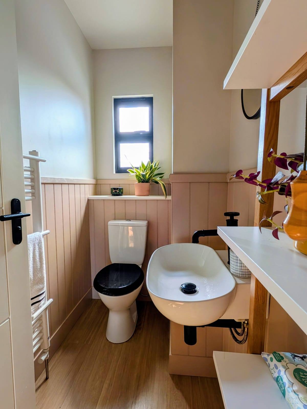 Cloakroom after fitting board and batten MDF panelling with a bullnose dado rail
