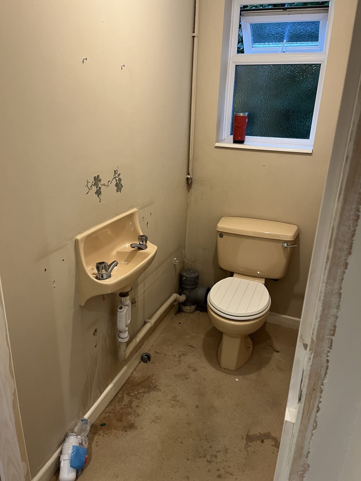 Bathroom with plain walls before MDF board and batten installation
