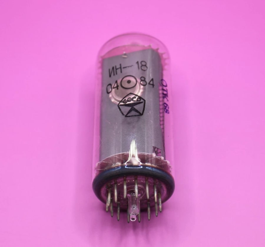 Base of an IN-18 tube showing the ring of pins and the glass tip in the middle