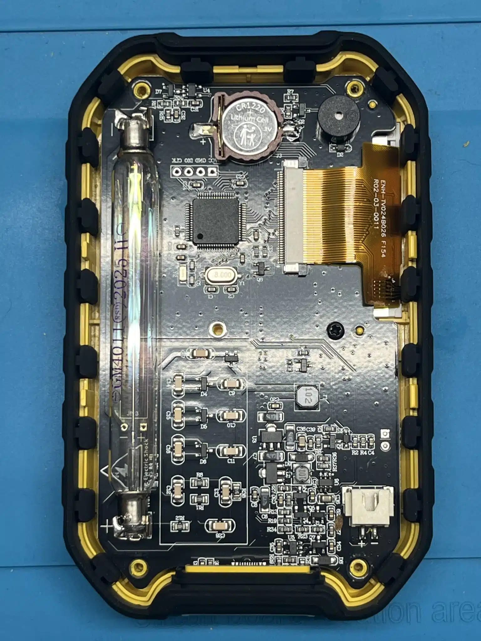 GC-01 opened, stock glass tube visible on the board