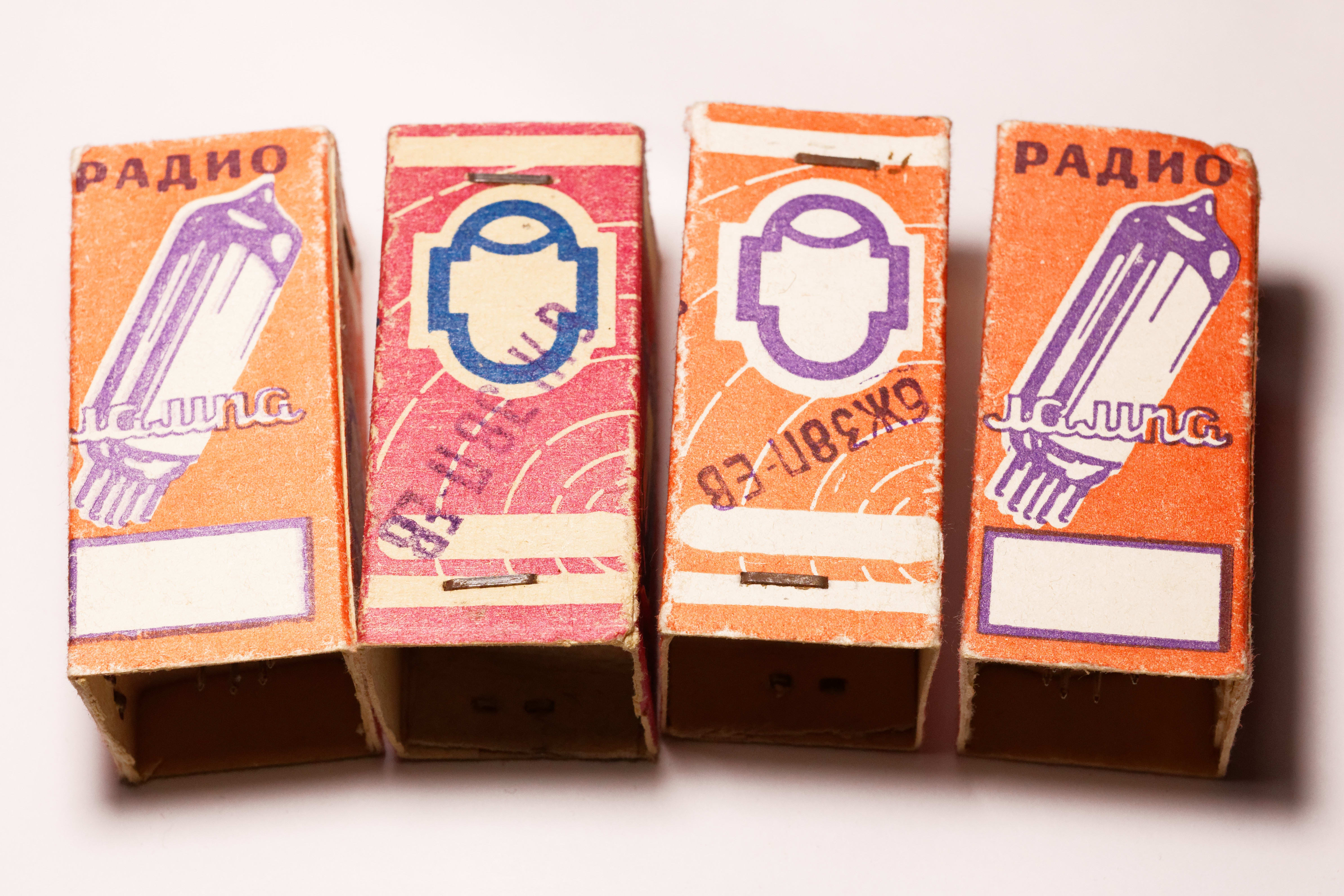 Soviet tube boxes with rubber-stamped type designation 6Zh38P-EV over the printed factory logo