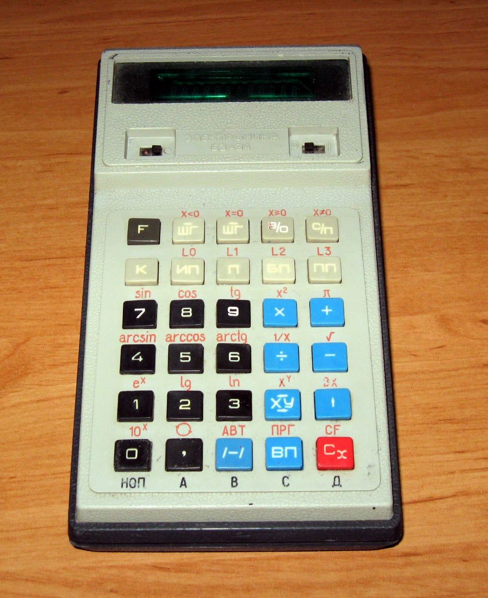 Soviet Elektronika B3-34 programmable calculator with green vacuum-fluorescent display, black and blue keys and red function labels