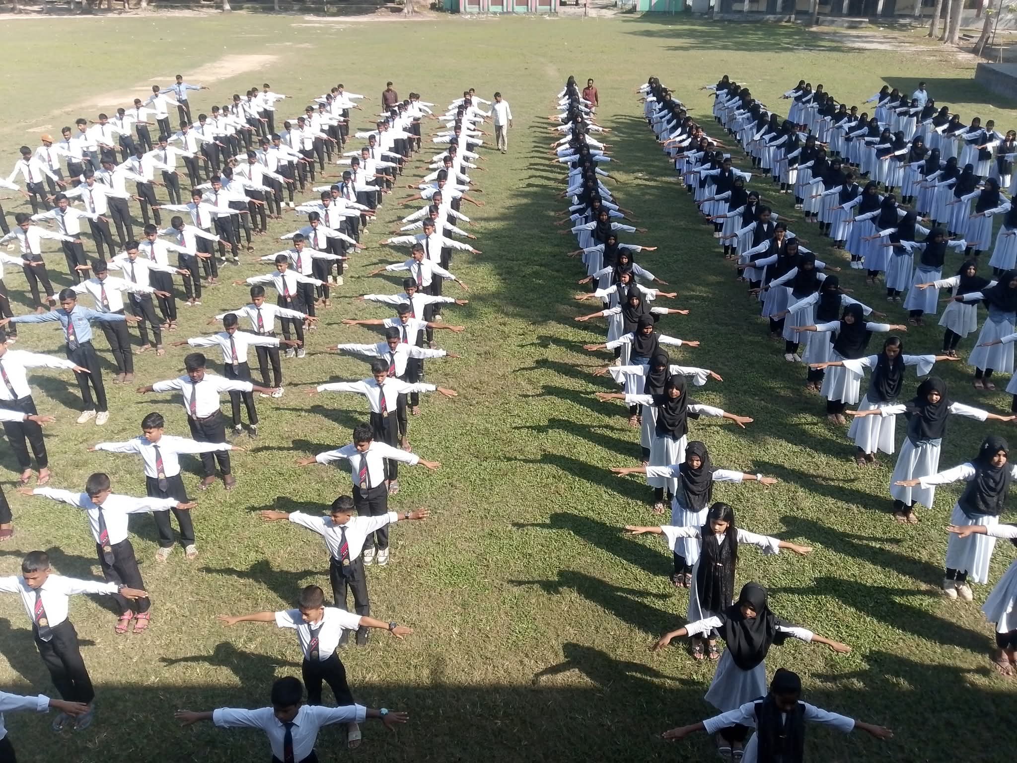 দৈনিক সমাবেশে শিক্ষার্থীদের ব্যায়ামের  ছবি - Album Cover