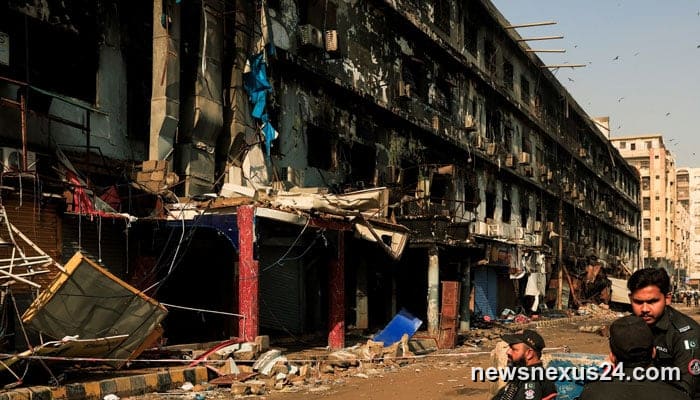 Gul Plaza fire toll rises to 60 as rescuers find dozens in a trapped shop