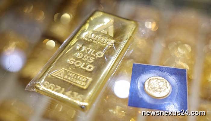Gold breaks $5,000 as investors rush to safety; silver tops $104