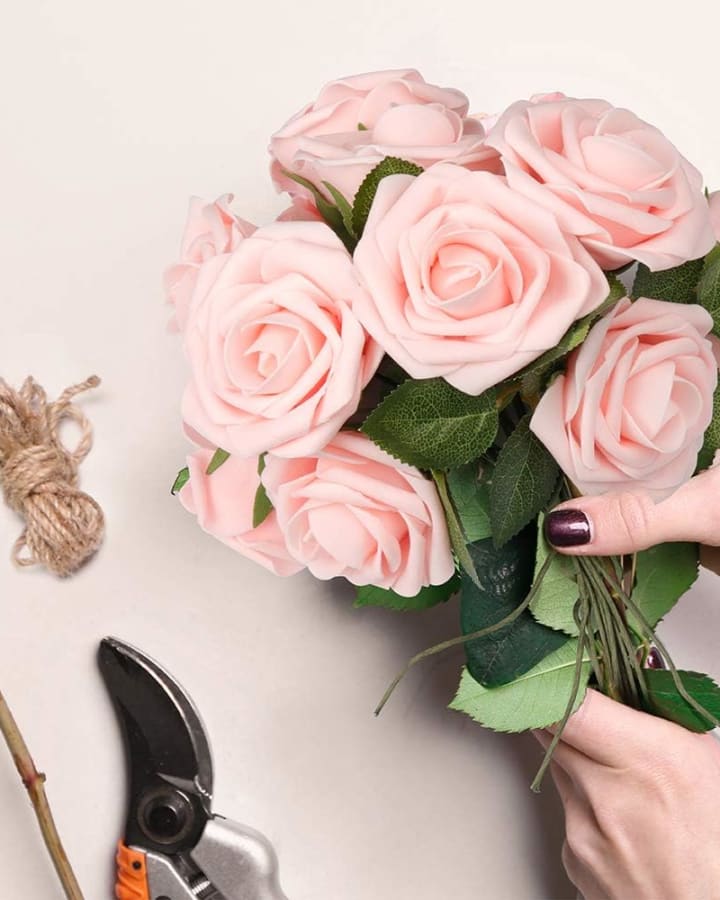 Real-touch foam rose arrangement styled as a table centrepiece