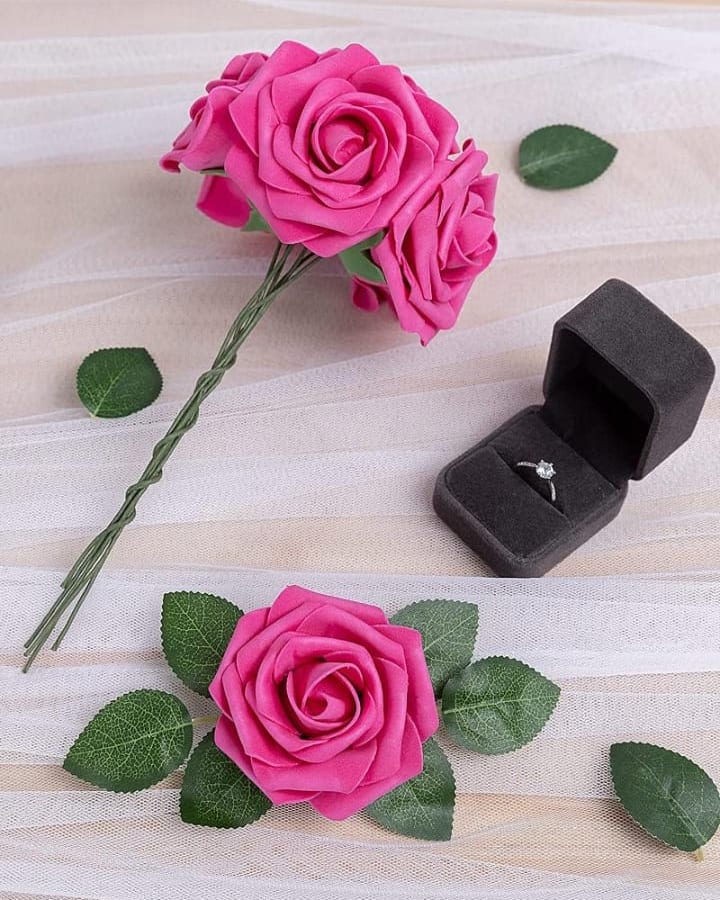 Pink real-touch foam roses presented as a gift