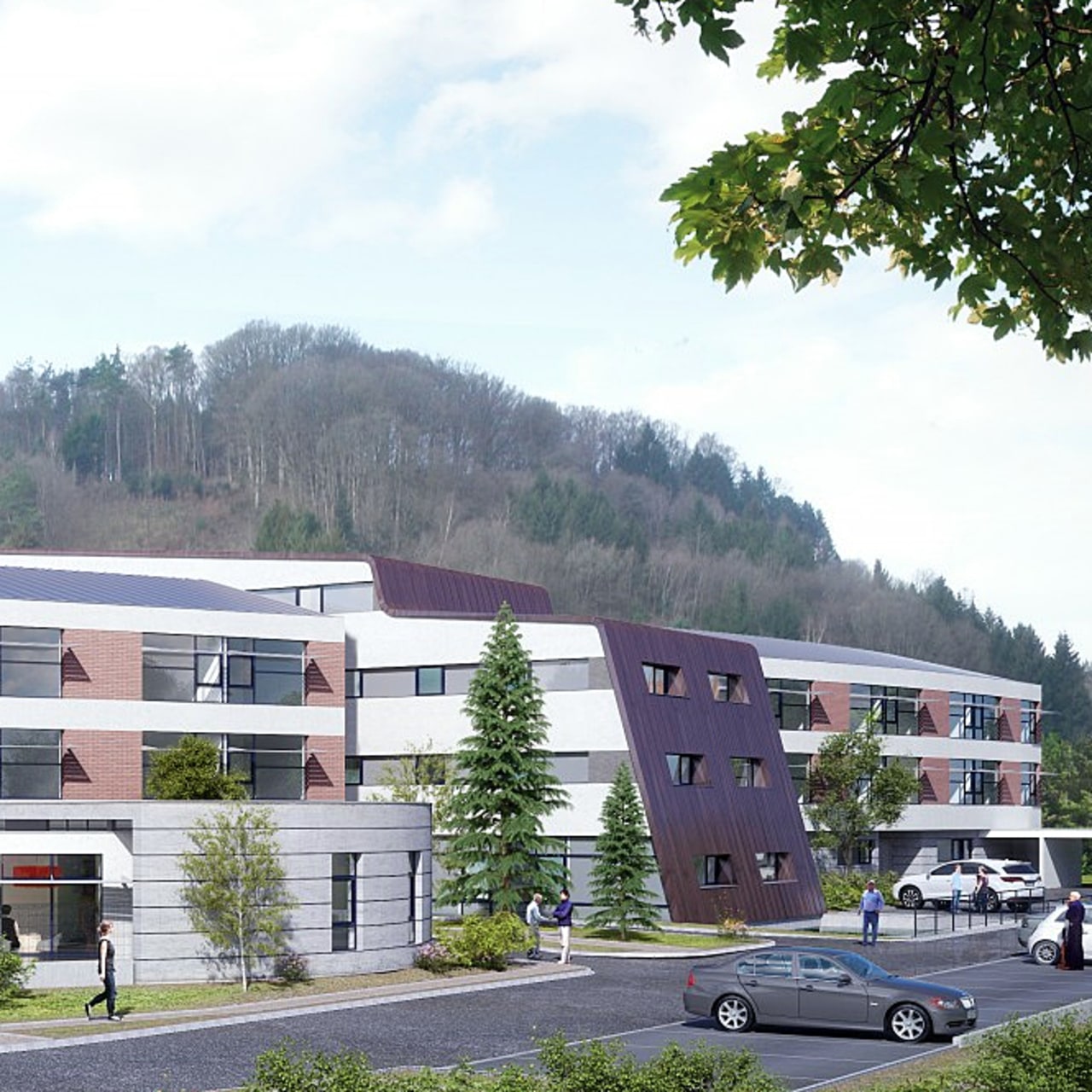 Le bâtiment a la forme de ballon de rugby traversé par une barre technique.