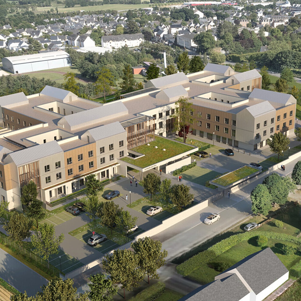 L'architecture est volontairement peu linéaire pour offrir une succession de façades pignons et préserver des espaces verts. (Adquatio architectes)