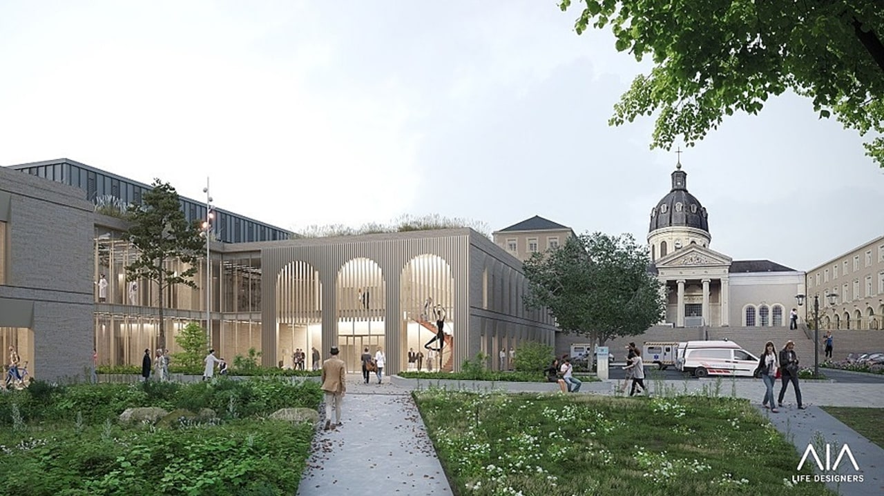 L'agence d'architecture a imaginé un hall d'accueil ambulatoire, avec des façades en pierre rappelant le tuffeau propre à Angers et du zinc aux étages et en toiture qui reprend les codes visuels du bâti ancien existant. (AIA Life Designers architectes/image Airstudio 2023)