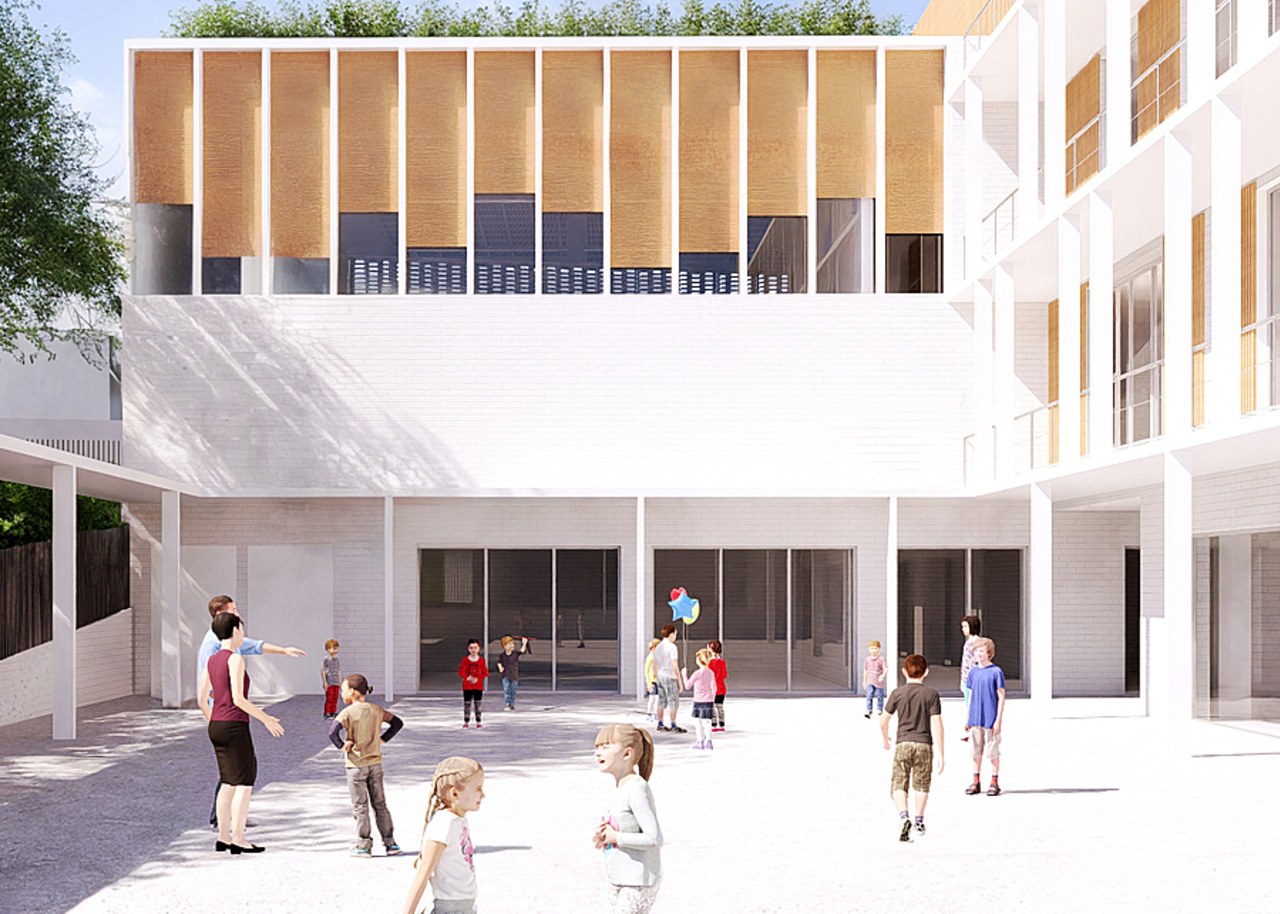 Le nouveau bâtiment forme un L sur quatre niveaux distribués autour d'une cour centrale. (Jean-Michel Jacquet)