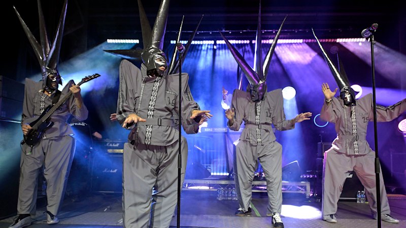 TISM's satirical approach to interviews and their enduring cult status