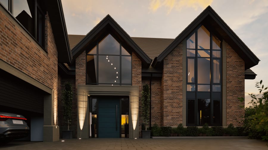Modern brick home exterior at dusk featuring dramatic gabled windows, teal front door, and elegant uplighting