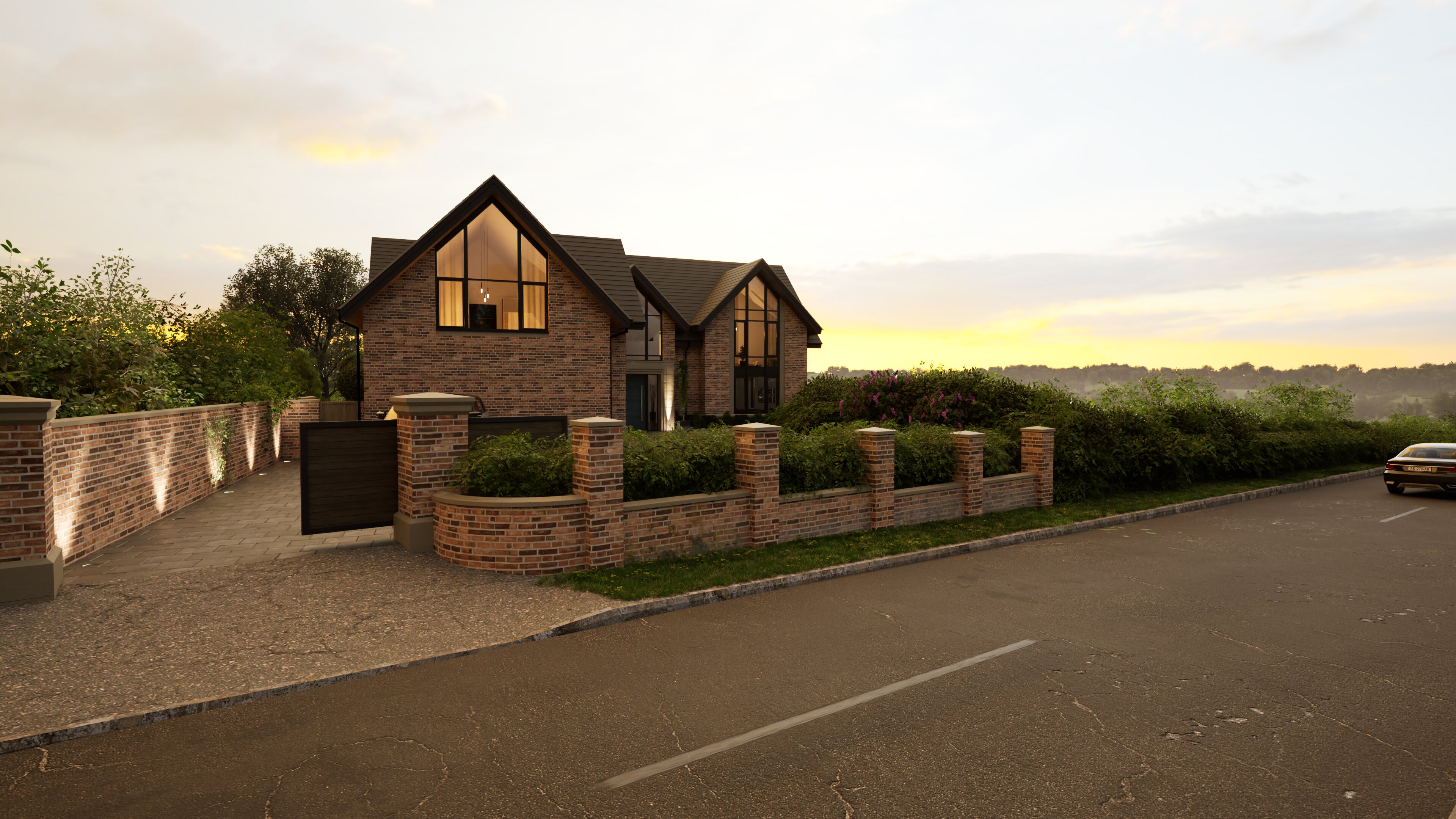 Modern brick house with large gabled windows, dark roof, brick boundary wall with hedging, photographed at sunset