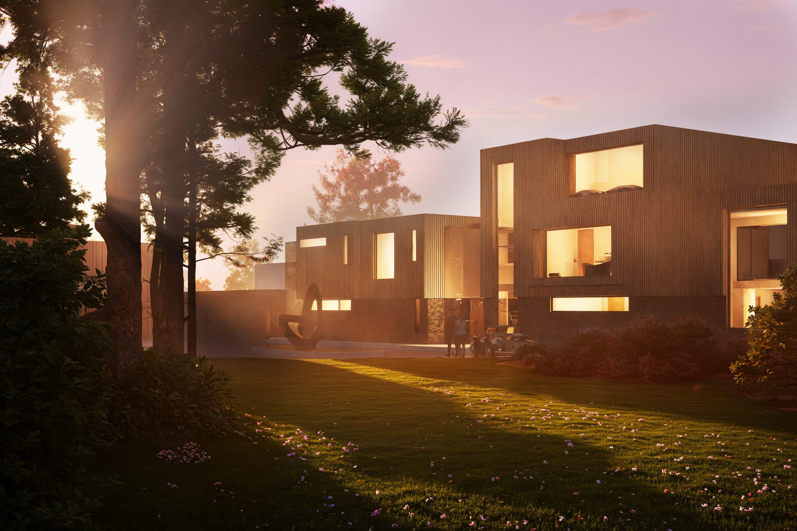Modern timber-clad residential buildings at sunset with illuminated windows, sculpture feature, and landscaped garden