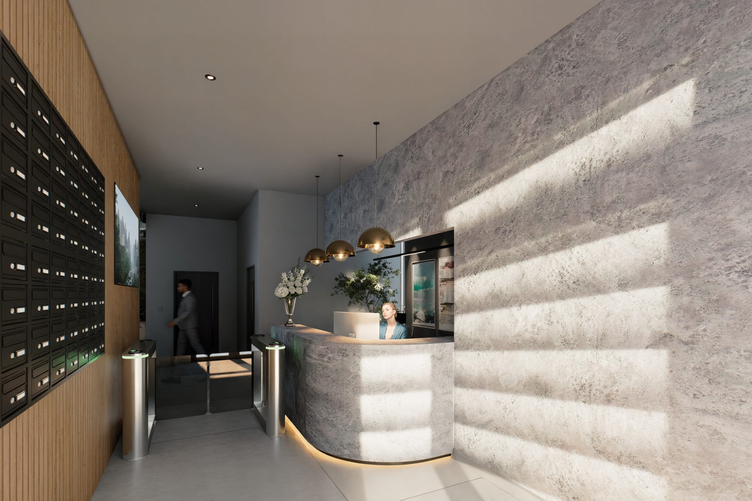 Modern building lobby with stone reception desk, brass pendant lights, mailboxes, security turnstiles, and natural light