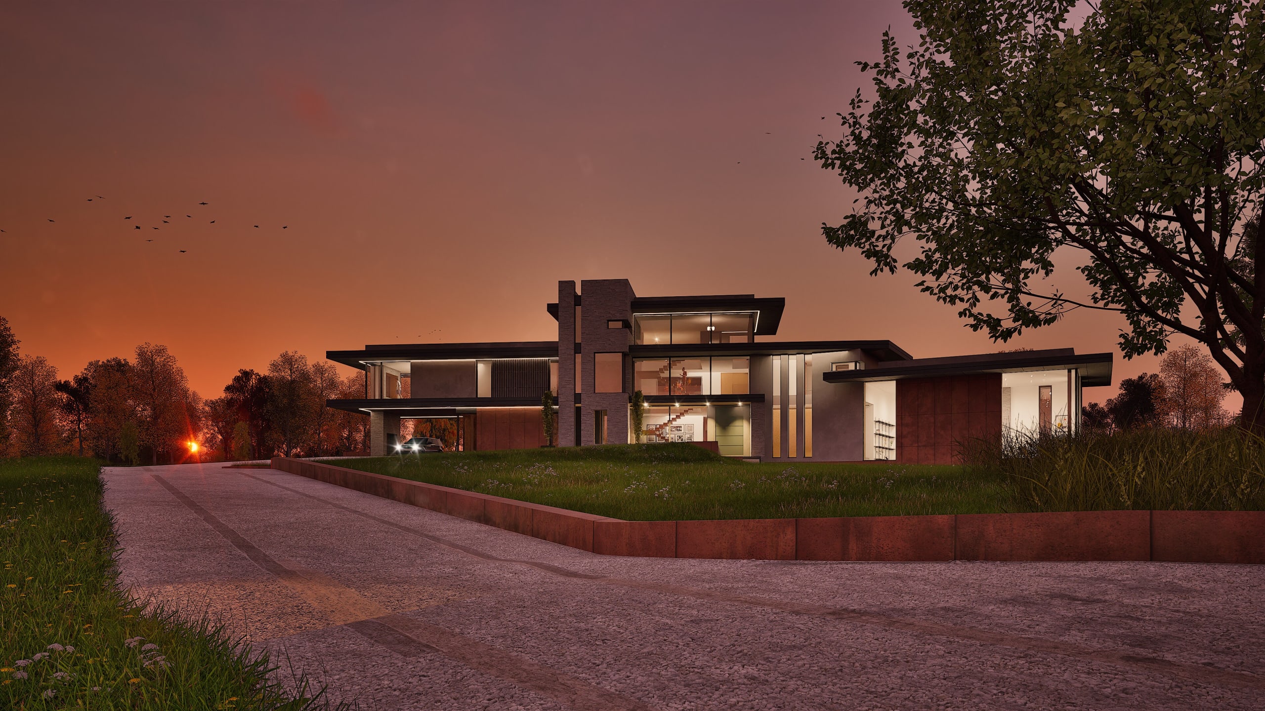 Modern two-story residential home with large glass windows and flat roof design illuminated at dusk with dramatic orange sky
