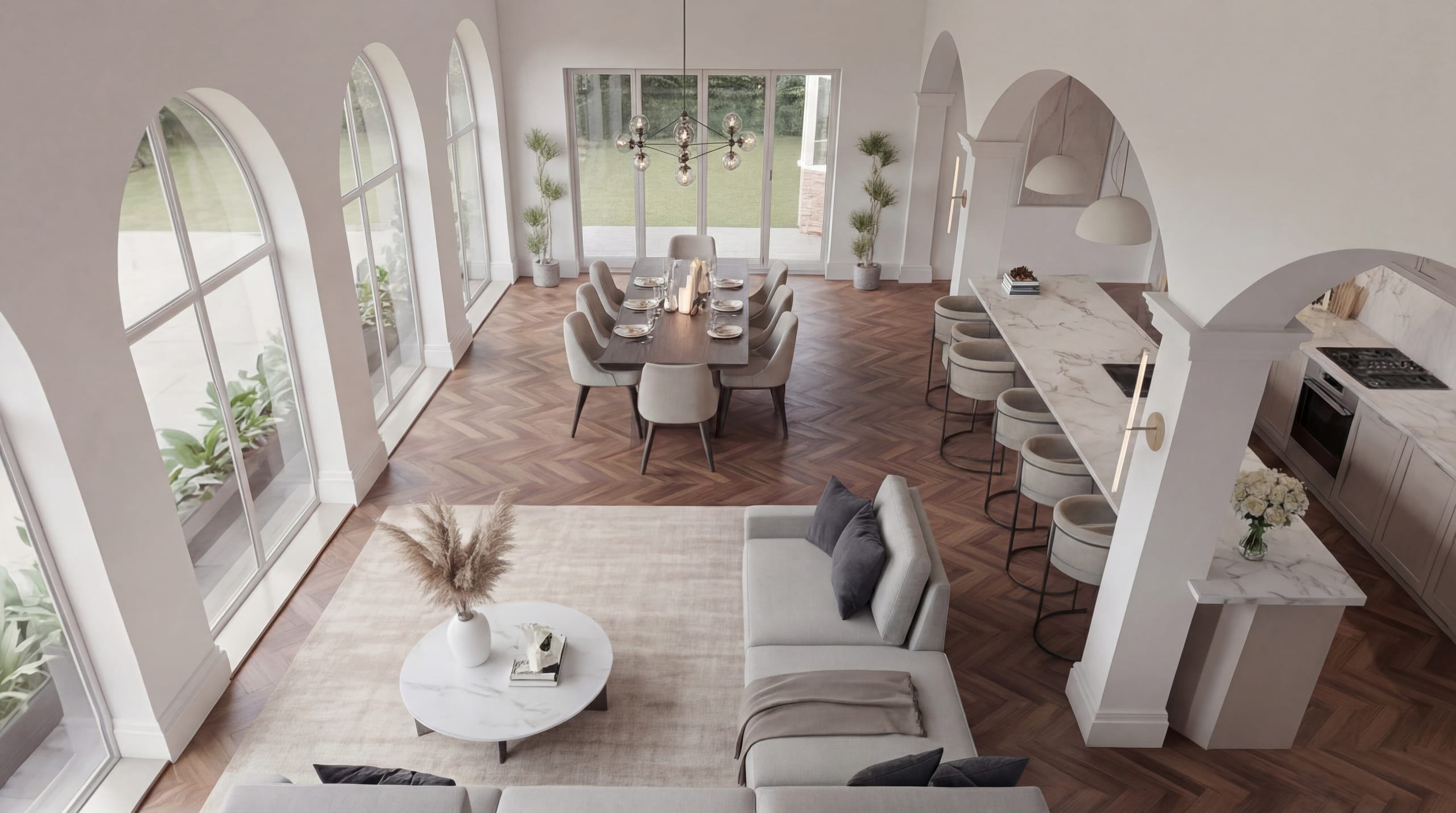 Open-plan living space with arched windows, herringbone wood floors, modern dining area, and marble kitchen island