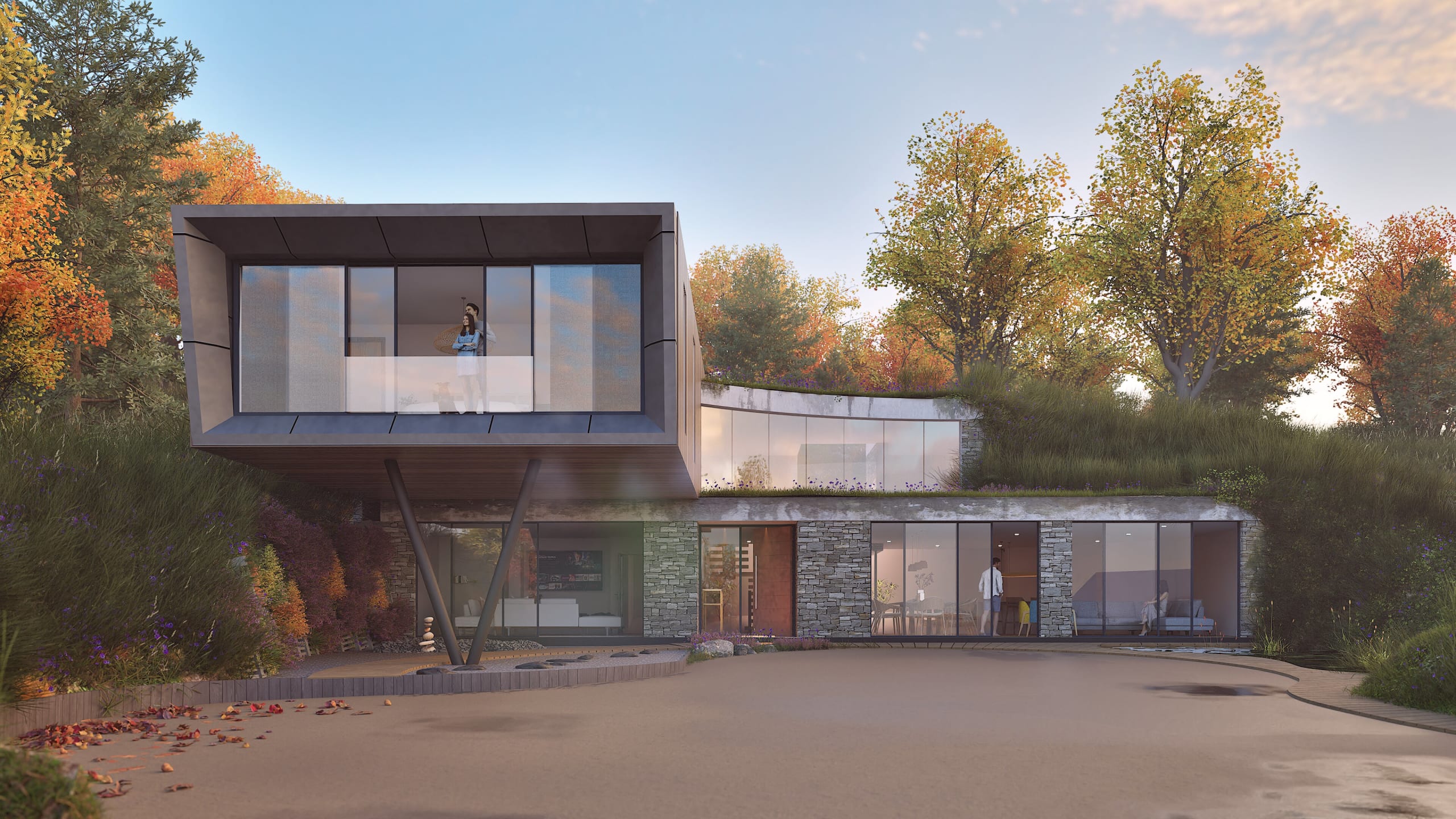 Modern cantilevered home with glass walls, stone base, and green roof nestled among autumn trees in wooded setting