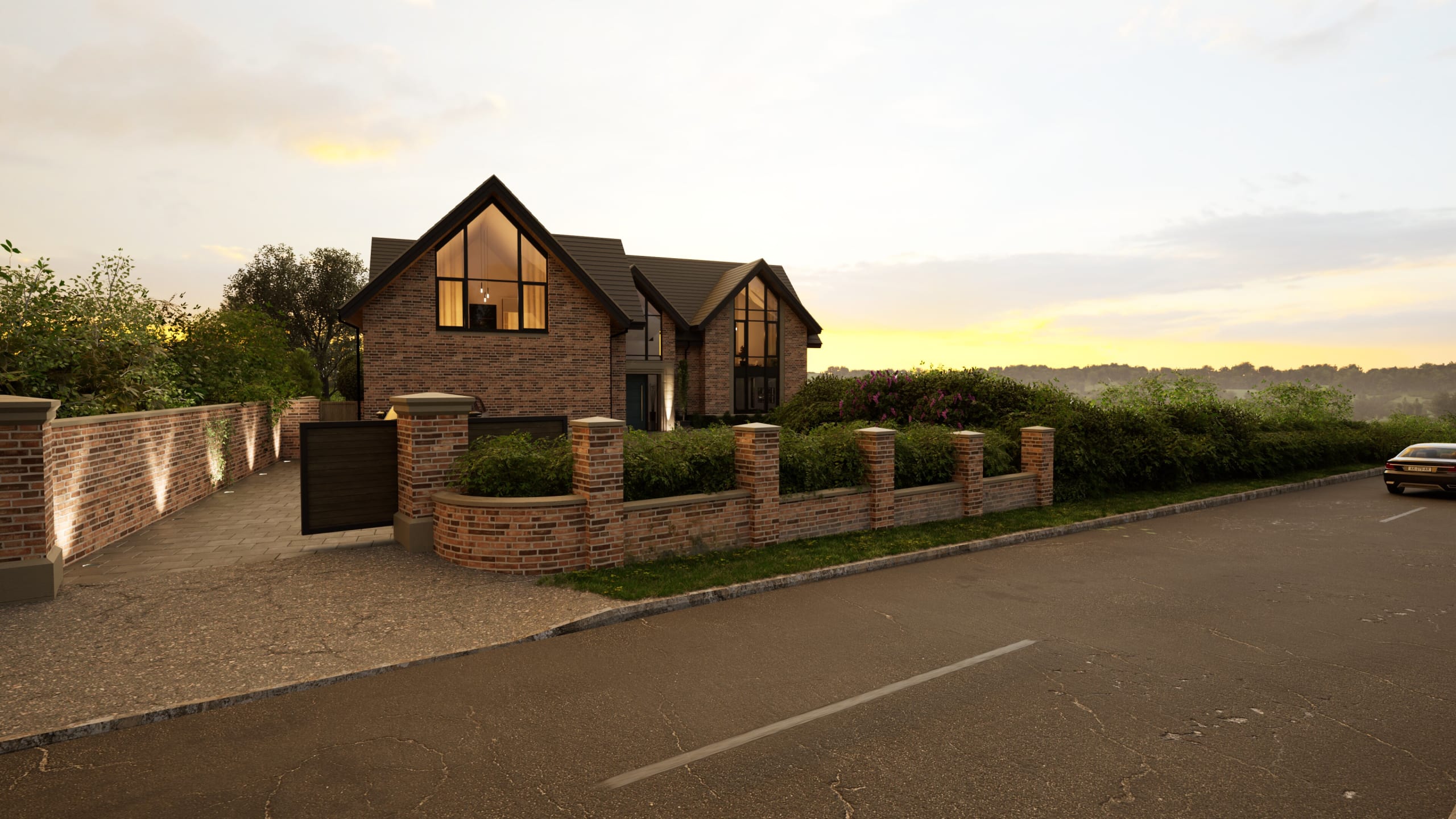 Modern brick house with large gabled windows, dark roof, brick boundary wall with hedging, photographed at sunset