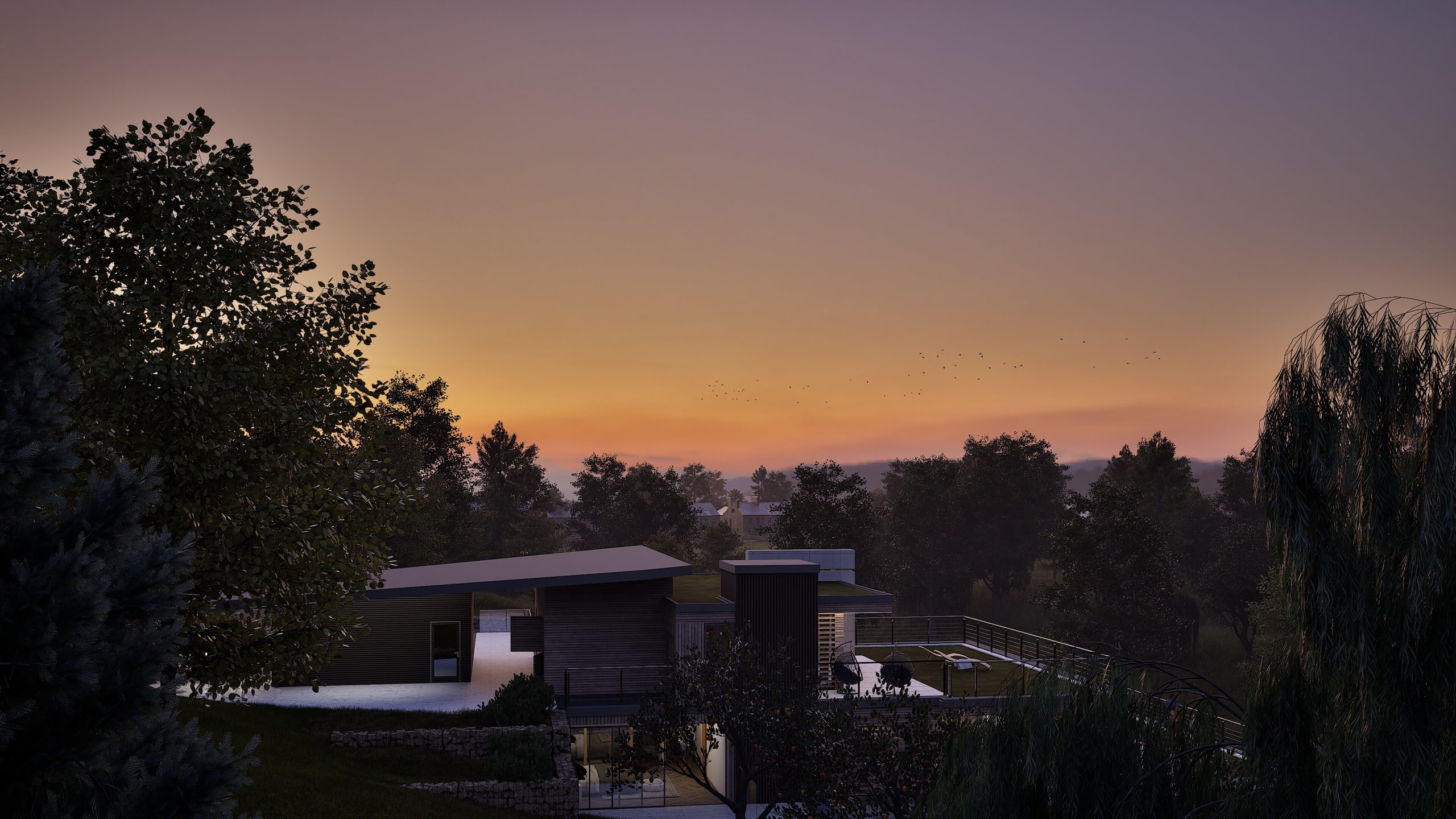 Modern residential property with flat-roofed buildings and swimming pool surrounded by trees at sunset with orange sky