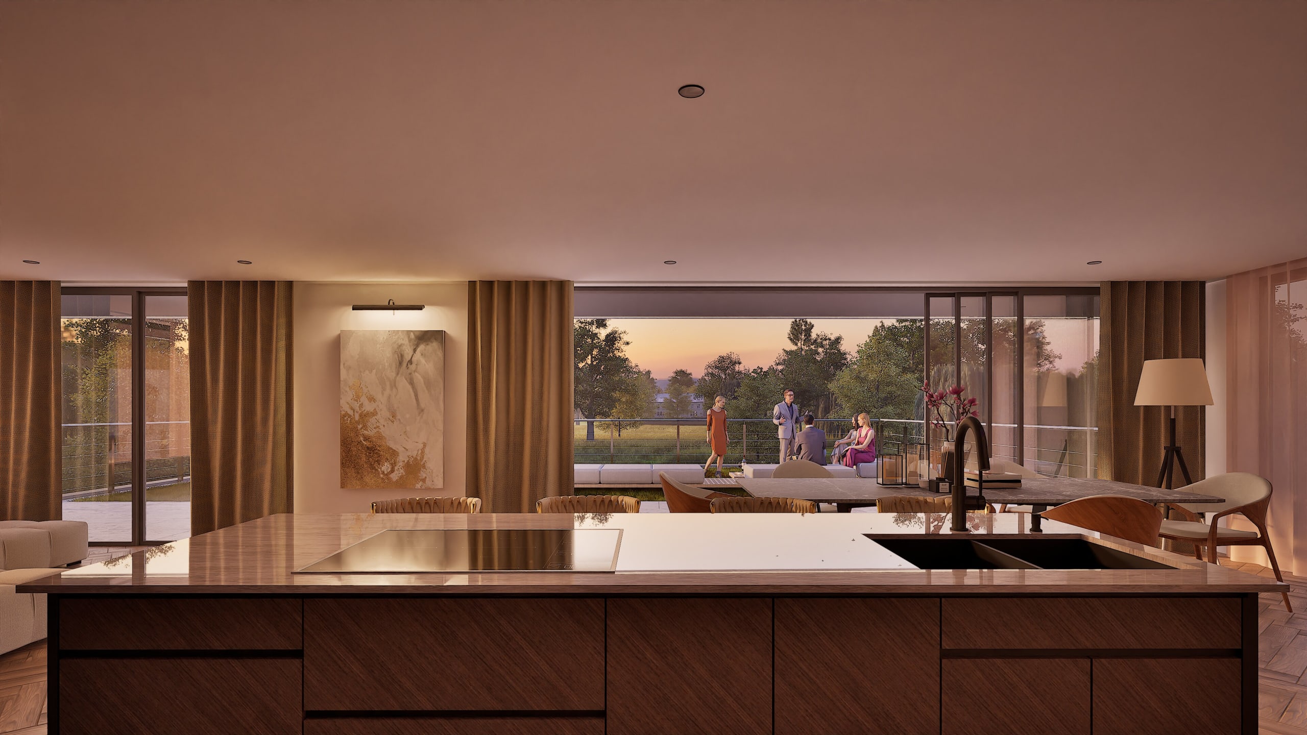 Modern open-plan kitchen with wooden island overlooking living area and terrace where guests gather at sunset