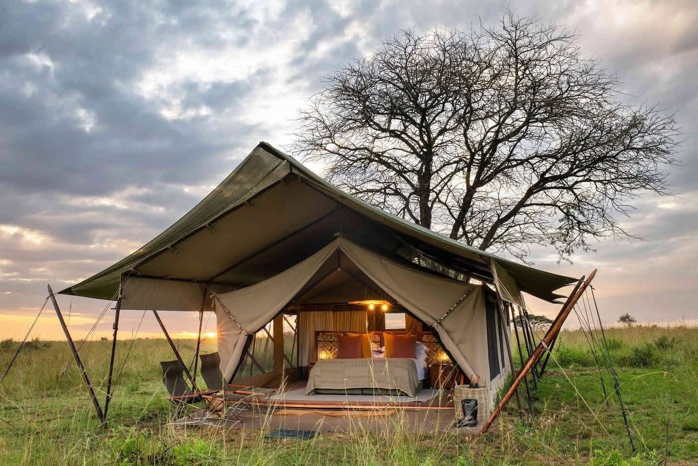 Luxury tented camp at sunset in the Serengeti