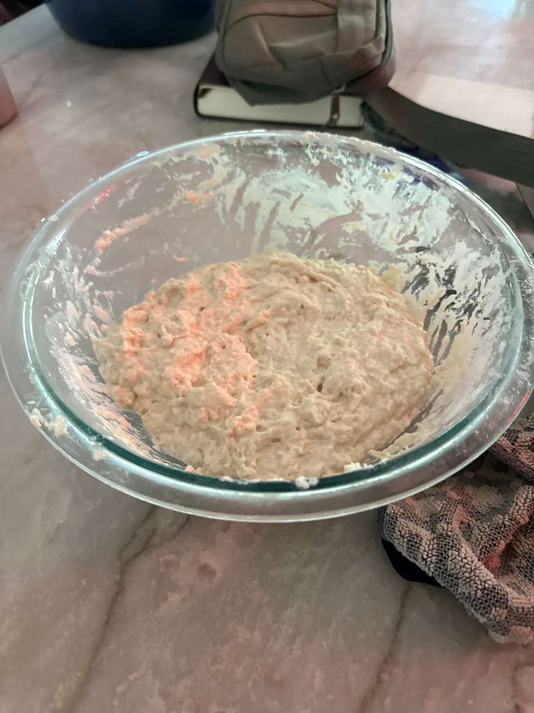 Performing stretch and fold on sourdough dough