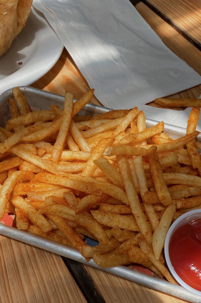 Golden fries served with dipping sauce