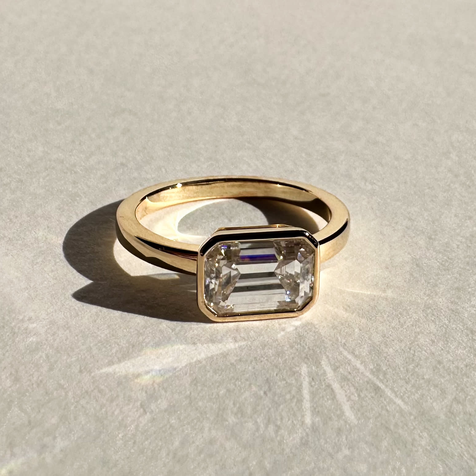 1.5 Carat Emerald Cut Diamond Solitaire Engagement Ring in 14K Yellow Gold Band