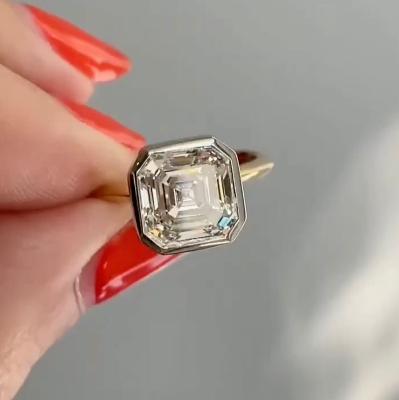 Asscher cut salt and pepper diamond in full bezel