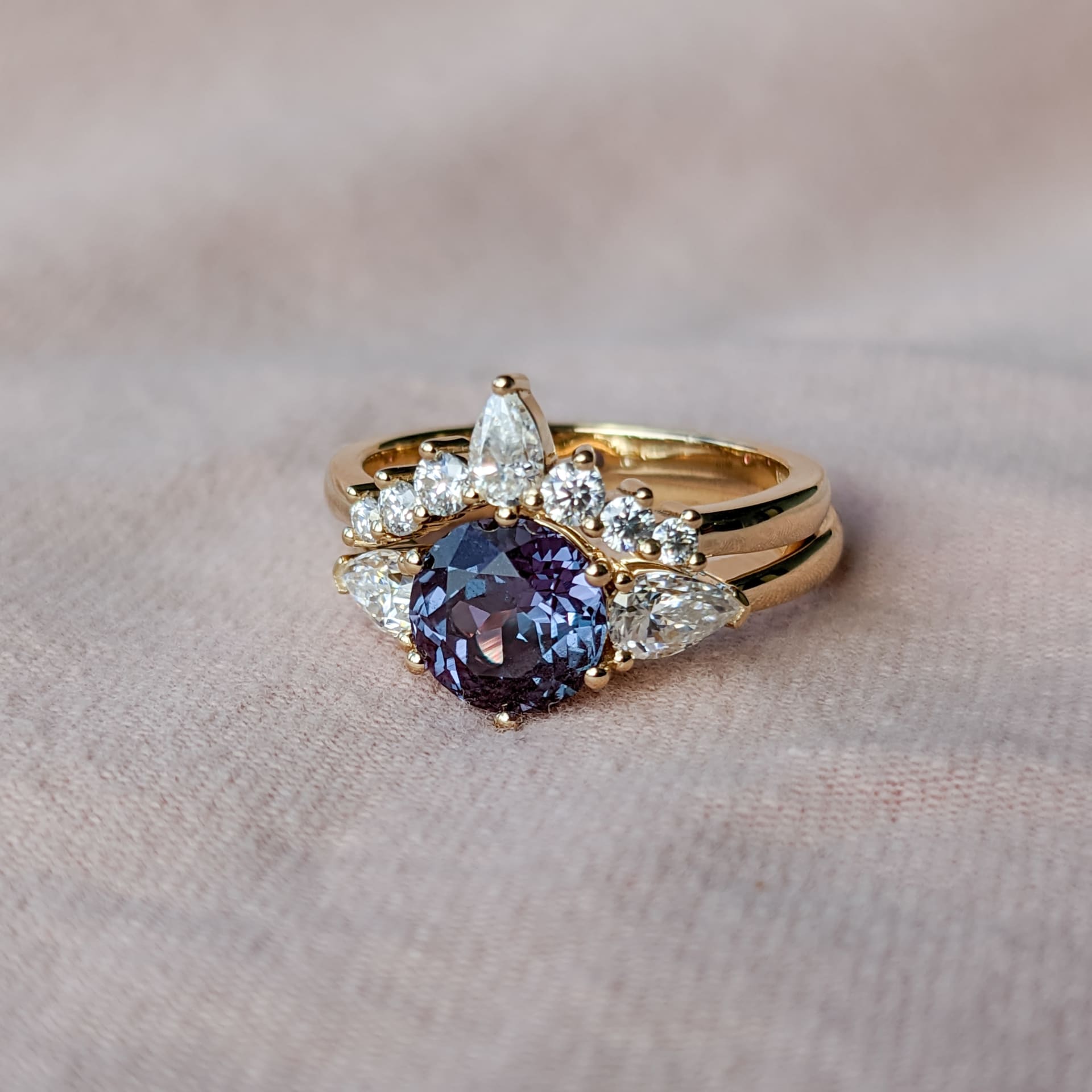 Round Alexandrite with accenting diamond pear stones & wedding band