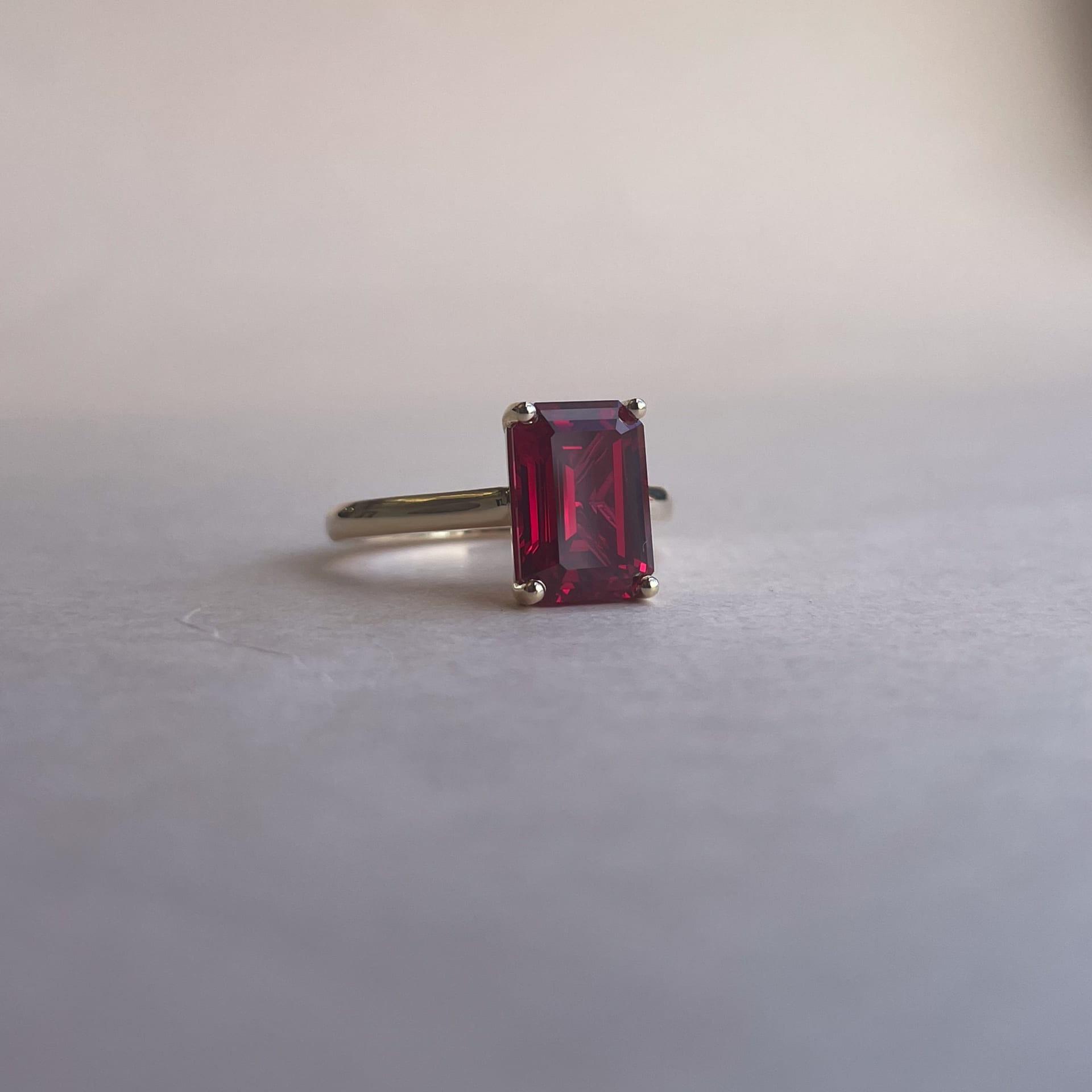 Sapphire Emerald Engagement Ring in a 14k Yellow Gold Band