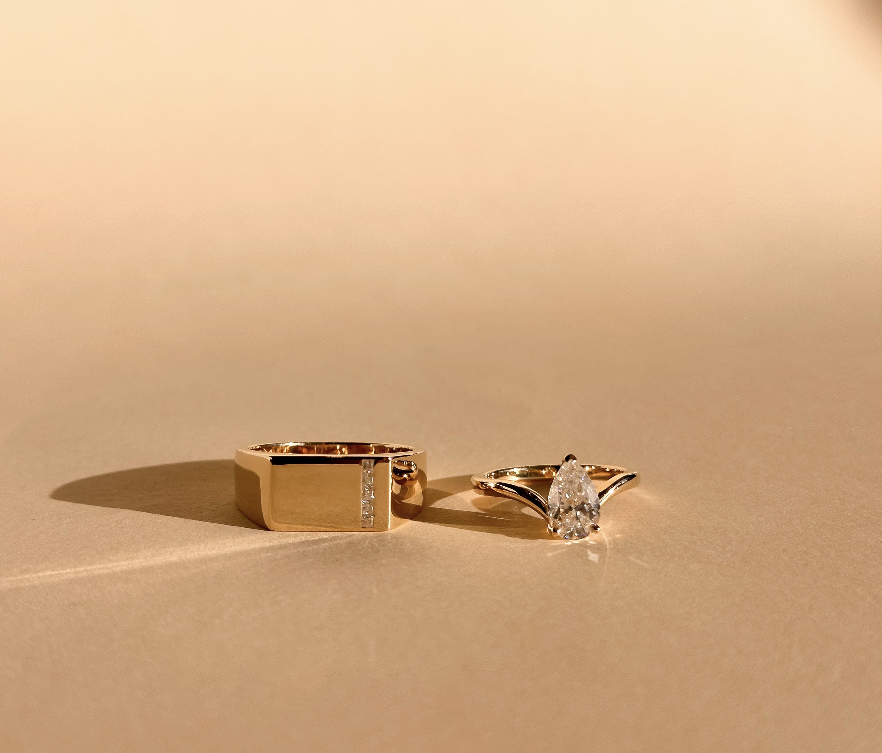 Diamond and yellow gold his and hers engagement ring set