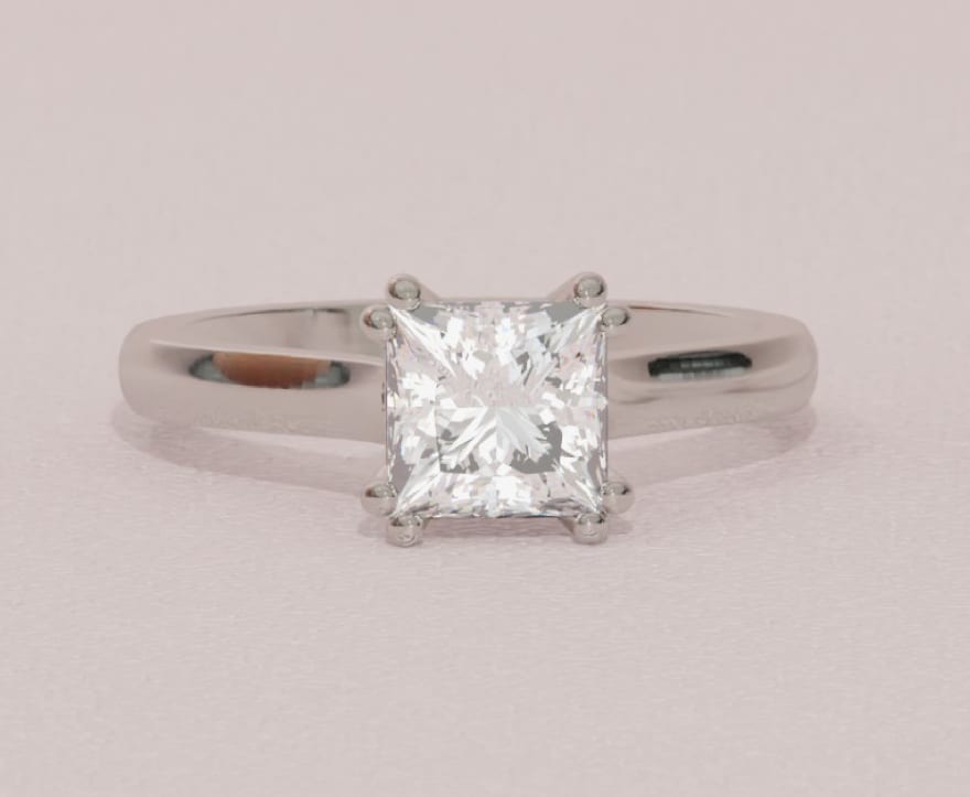 Princess cut solitaire with a white gold band.jpg