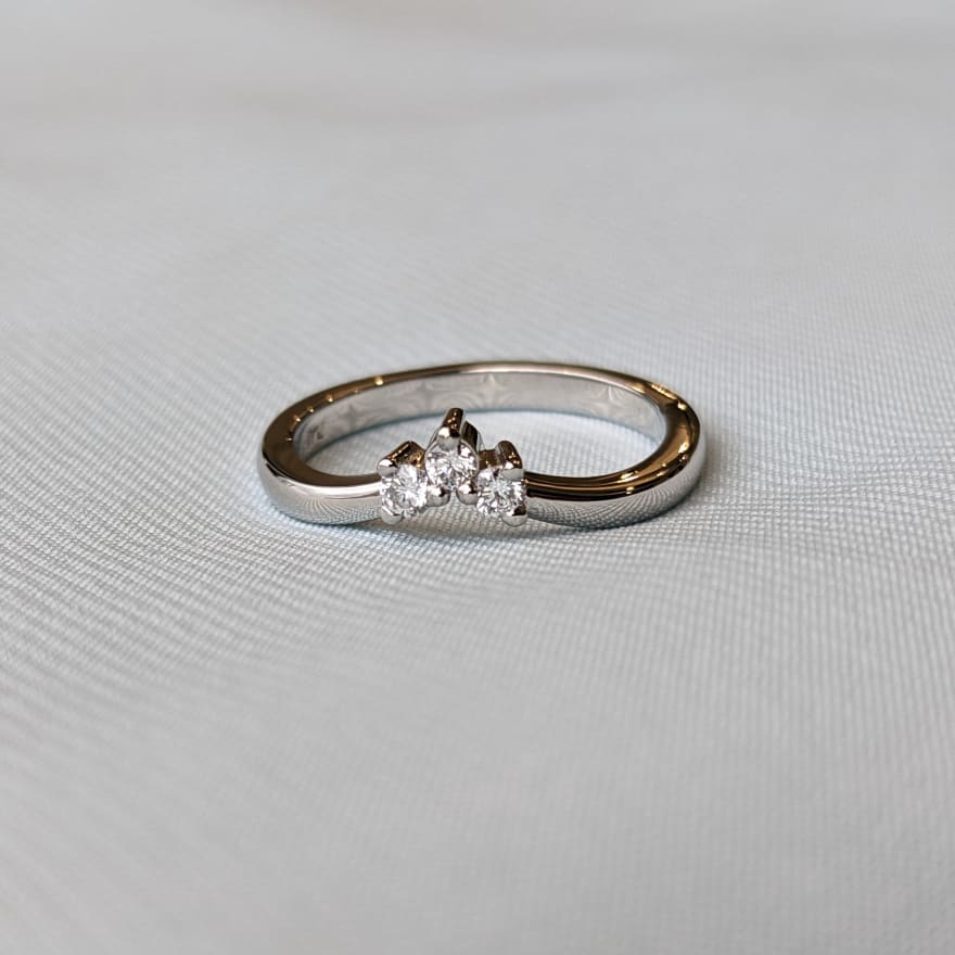 Small three stone dainty engagement ring