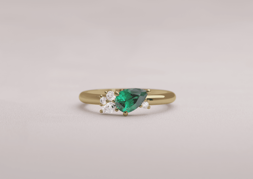 Dainty Asymmetri Emerald Engagement Ring