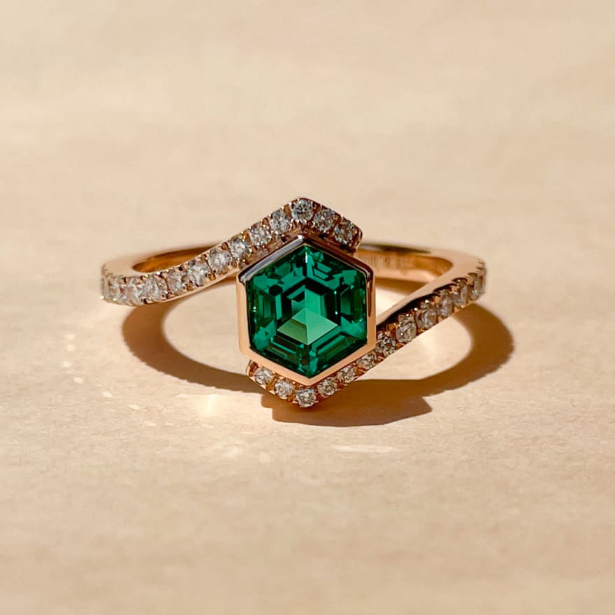 Octoganal emerald with gold band.jpg