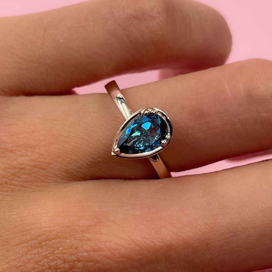 Blue Moissanite Pear Solitaire in 14K Gold