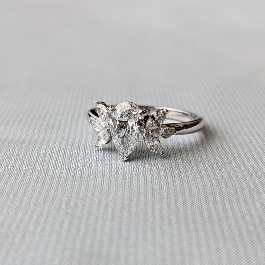 7 Stone Engagement Ring with Pear Centre and Marquise Accents