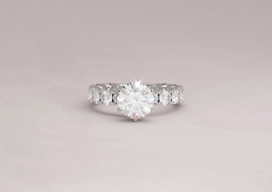 5 carat Round Diamond with scallop set diamonds along the band