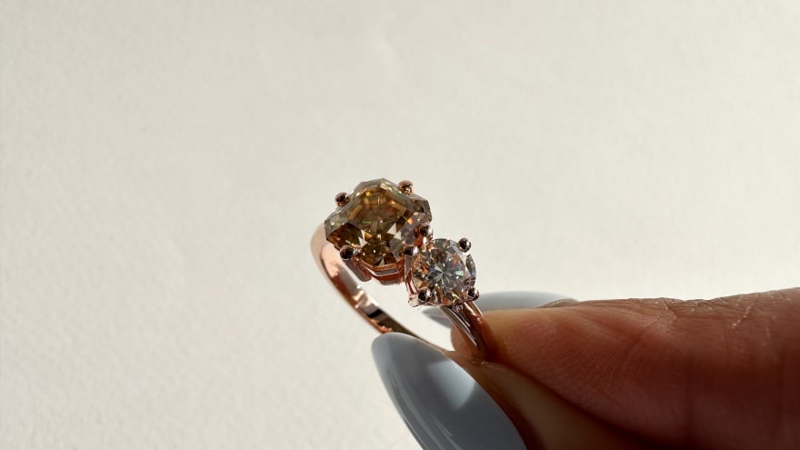 Toi et moi with a 2 carat yellow Asscher cut diamond and 1 carat round in a rose gold band