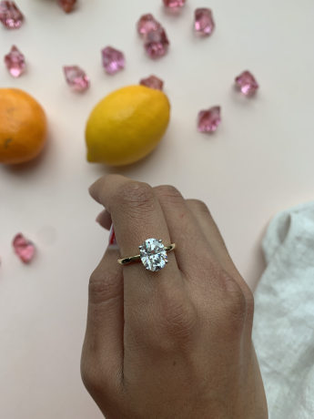 A sustainable lab diamond on top of a leaf