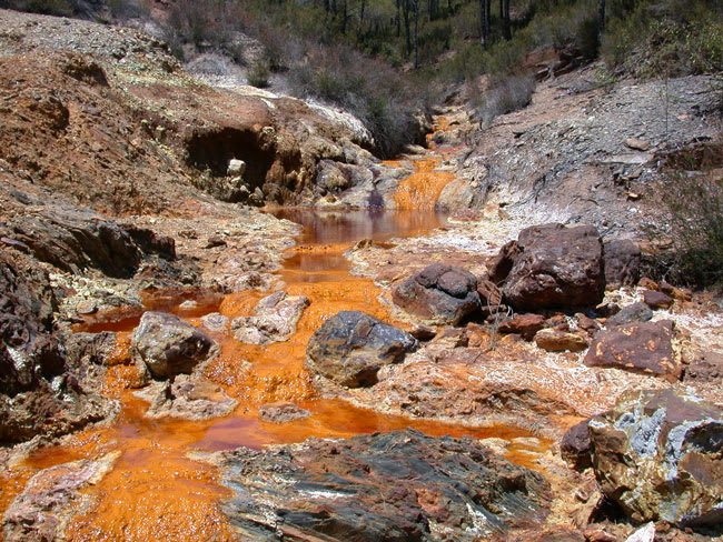 Acid mine drainage can turn waterways orange to red