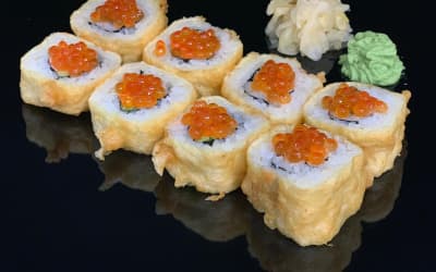 Hot roll with salmon and red caviar