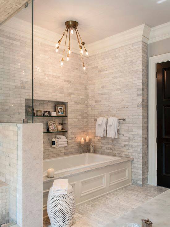 homebunch.com
stylish marble tiles on the floorings, walls, and shower bring a unified aim to this stylish area. The gleaming white marble is specifically helpful in bathrooms