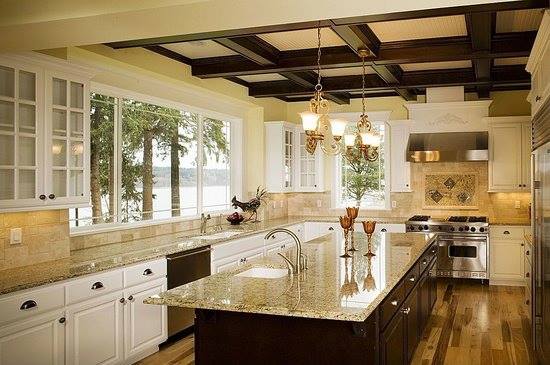 Great kitchen Island in cherry with garnit top Note the under mount sink and short overhang on the Island