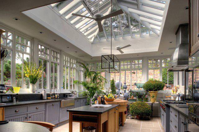 Image shows an Atrium Kitchen with plenty of light to grow your spices what a great space for Kitchens with Island